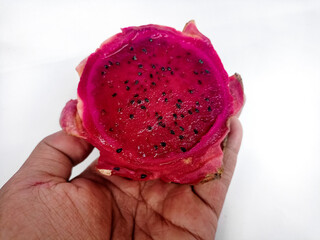 Dragon fruit on hand fruit dragon background white food isolated red pink fresh organic tropical sweet exotic nature pitaya healthy cactus pitahaya nutrition ripe raw bright asian fruits delicious