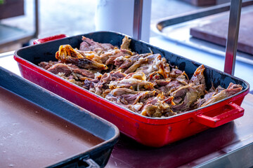 Close-up of a luxury hotel meat open buffet. Roast and grilled lamb, goat, beef and chicken, served...