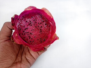 Dragon fruit on hand fruit dragon background white food isolated red pink fresh organic tropical sweet exotic nature pitaya healthy cactus pitahaya nutrition ripe raw bright asian fruits delicious