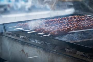 Close-up of a luxury hotel meat open buffet. Roast and grilled lamb, goat, beef and chicken, served...