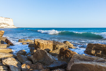  Evening Cyprus Seashore with Rocks on Sandy Beach and Sunset Horizon
