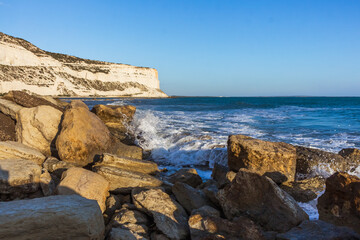  Evening Cyprus Seashore with Rocks on Sandy Beach and Sunset Horizon