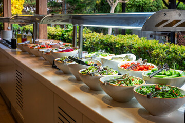 Mediterranean cuisine, olive oil, healthy and delicious  salad varieties with green...