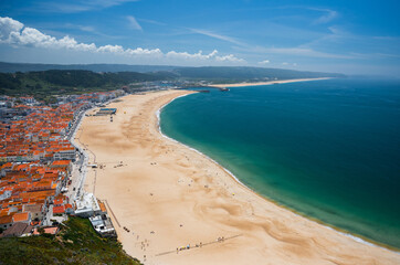 Panoramic View of Nazare Coastal Town with Red Rooftops and Atlantic Ocean in Portugal