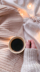 Cup of coffee in hand