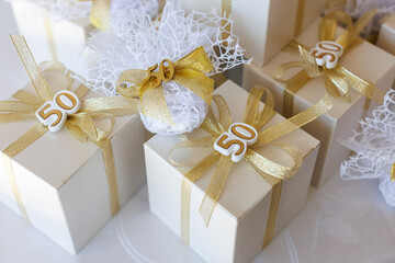 anniversary, wedding, rose, celebration, gift, love, party, decoration, pie, colours, ribbon, gold, 50, emotion, ring, white, birthday, eatery, flower, red, vacation, sweet, belief, colourful, elderly