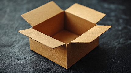 Empty cardboard box on dark surface