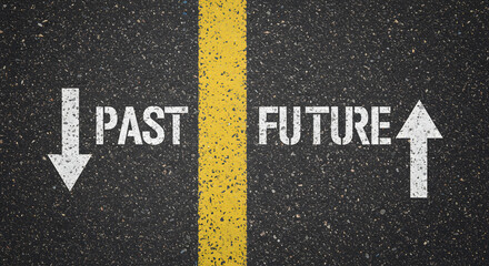 future and past painted on an asphalt road