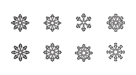 Collection of intricate snowflake designs in a black silhouette style