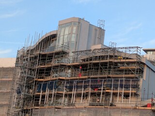 Heavy scaffolding on a large new building being renovated