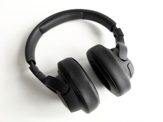 Black over-ear headphones isolated on a white background. Sleek and minimalistic design, ideal for music, podcasting, and modern lifestyle visuals.