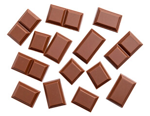Milk chocolate pieces isolated on white background from top view