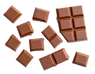 Milk chocolate pieces isolated on white background from top view