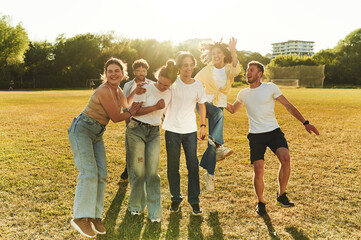 Wellbeing conception. Young friends are having fun on the field
