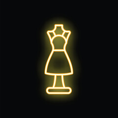 Neon yellow glowing mannequin with a short dress on a black background