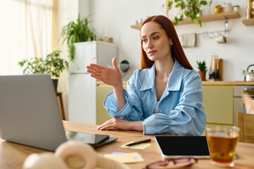 Language teacher engages students online from her cozy home workspace with red hair