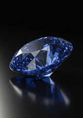 A brilliant oval cut blue diamond gemstone glittering on a reflective black surface