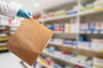 A medic's hand holds a grocery basket whether a package