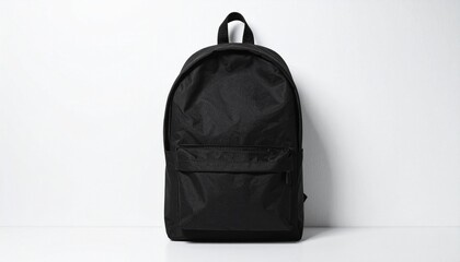 Fototapeta premium Render a sleek black backpack with large main compartment, smaller front pocket, top handle, and nylon texture, isolated on a clean white background to emphasize minimalist design and everyday utility