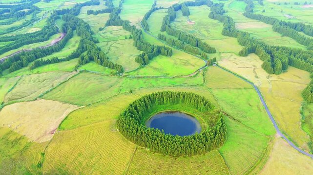 Pond Pau Pique and Lush Green Hills. Azores, Sao Miguel Island. Portugal. Aerial View. Orbiting