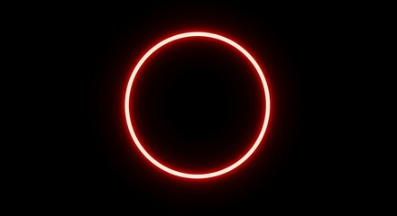 A vibrant red ring glows ominously against a stark black background, creating a visually striking and mysterious abstract composition