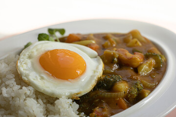 Shrimp curry and fried egg
