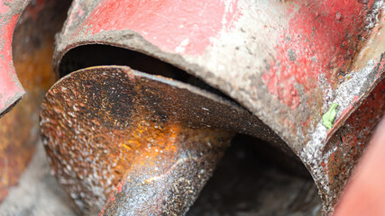 Close-up at turning screw part of the chemical blender machine. The equipment that using to feed and blending the chemical. Industrial equipment object, selective focus.