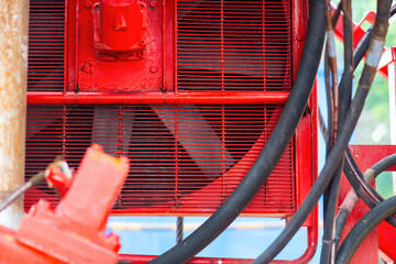 Ventilate fan part of the electricity  generator engine, using to cooling the temperature inside the machine. Industrial equipment object, close-up and selective focus. 