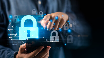 Concept of cybersecurity and mobile data protection with glowing padlock icon, symbolizing online privacy, secure access, digital safety, technology security for personal and business information.