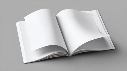 Open book with blank white pages resting on a plain, light gray surface