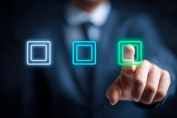 Businessman Interacting with Virtual Screen Featuring Color Icons