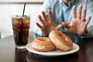 no fastfood dieting or good health concept young woman rejecting junk food or unhealthy food such donut sweets or soda drink and choosing healthy food such as fresh fruit or vegetable