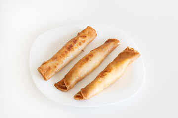 Rolled Pancakes Served on Plate