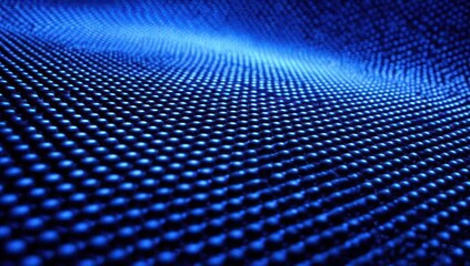 A deep blue surface texture, featuring a repeating pattern of small spheres, undulates in a smooth wave-like form.