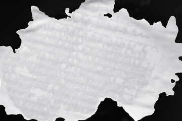 Wet paper. Wet spot on white paper. Water spot on paper