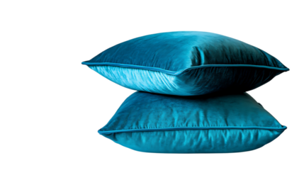 Two teal pillows stacked together showcasing soft