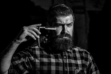 Barbershop. Straight razor, barbershop, beard. Vintage straight razor Black and white