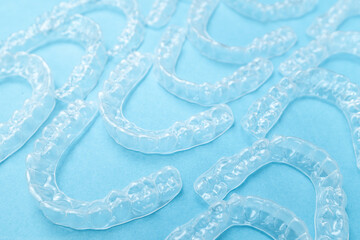 Orthodontic silicone aligner background. Advertisement of invisible braces retainer. Medical website concept. Pros and cons of aligners.