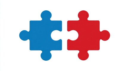 Obraz premium Two interlocking puzzle pieces, one blue and one red, isolated on a plain white background