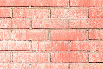 Old red brick wall texture. Grunge surface with stains and leaks. Weathered construction material background. Rustic urban detail for design. Rough masonry closeup. Vintage industrial surface pattern.