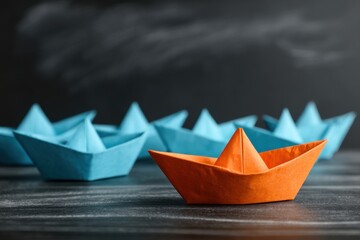 Paper boats, leadership concept