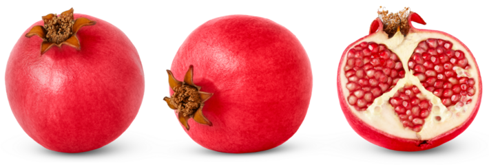 Ripe pink pomegranate fruits and cut in a half isolated with clipping path.