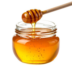 Honey dripping from dipper into jar