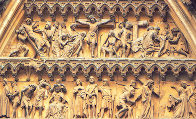 Intricate Medieval Bas-Relief Depicting Religious Scenes on Fasade Cologne Cathedral