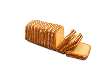 Loaf sponge cake with white icing stripes, partly sliced to show soft texture, on a white background. A delicious bakery dessert. The image is isolated on a transparent PNG background.