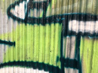 Textured 3d wall red and green street-art graffiti paint wallpaper background web texture