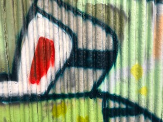 Textured 3d wall red and green street-art graffiti paint wallpaper background web texture
