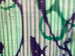 Textured 3d wall red and green street-art graffiti paint wallpaper background web texture