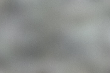 Abstract textured background with subtle gradients of gray and white