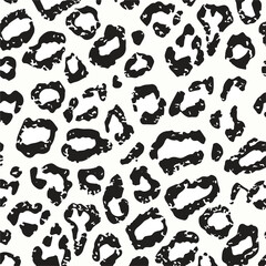 Leopard print. Vector seamless pattern. Animal skin background with black and brown spots on beige backdrop. Abstract exotic safari texture. Jaguar, leo, puma cheetah fur pattern. Repeat design